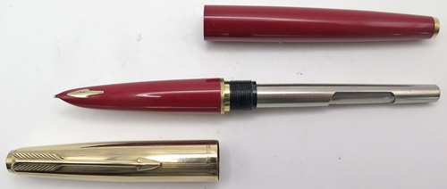 ITEM #6822R: PARKER 61 FOUNTAIN PEN IN BURGUNDY. GOLD PLATED TRIM. PLATD GOLD DOUBLE JEWEL. LATER ENGLISH VERSION. BROAD STUB NIB. CARTRIDGE FILLER. ROBOT CONVERTER.